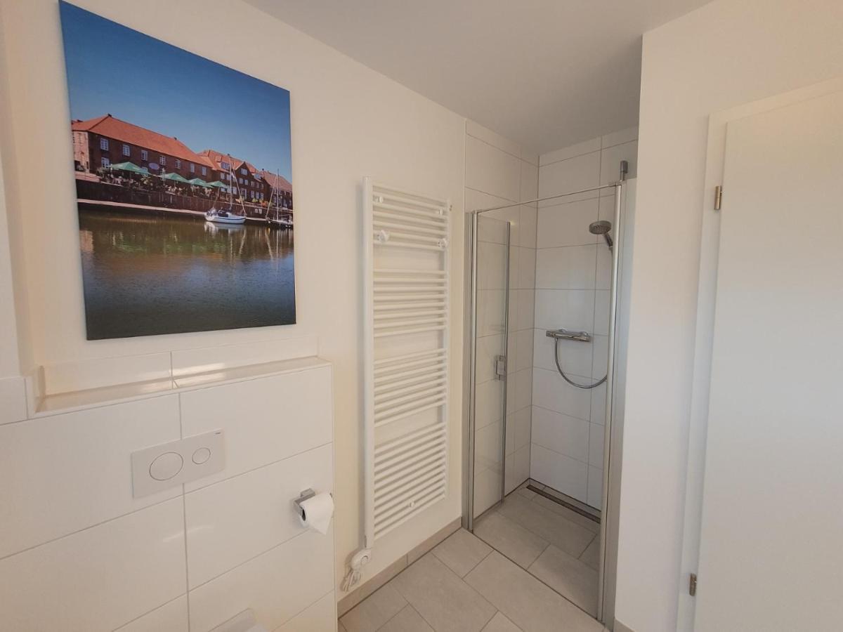 Strandkajuete Hooksiel Schillig Esterno foto