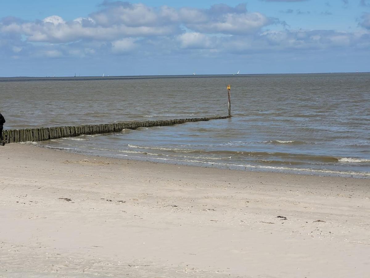 Strandkajuete Hooksiel Schillig Esterno foto